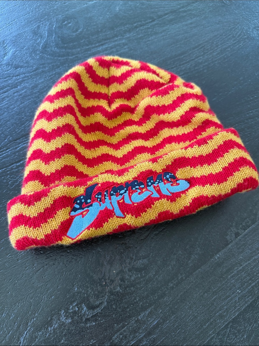 Supreme Red and Yellow Wave Knit Beanie with Script Patch